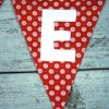 Slinger voor Fenna in oranje met witte letters. - Afbeelding 2