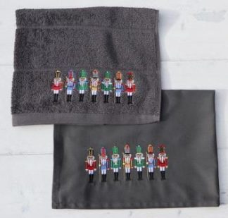 Keukenhanddoek en theedoek donkergrijs met zeven notenkrakers op een rij