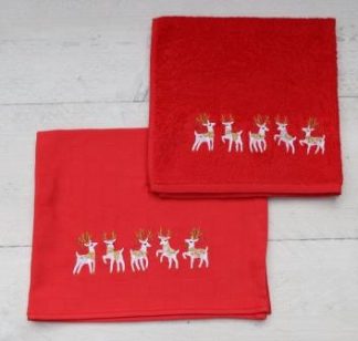 Keukenhanddoek en theedoek rood met vrolijke hertjes op een rij